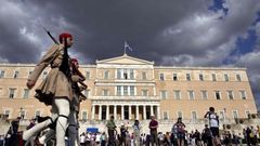 Greek central bank warns of 'painful' euro and EU exit - BBC News