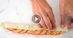 She wraps some apple slices inside a puff pastry. When she's done? It's almost to beautiful to eat