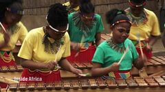 Incredible children's band of 1,600 play ancient Zulu instrument | CNN